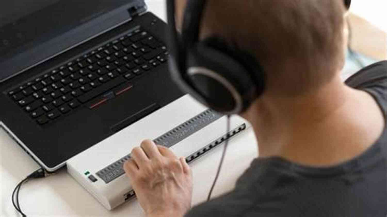A Visually Impaired Person Wearing Headphones And Using A Screen Reader To Access Online Content. Mothers Over Nangarhar (Kathryn A Morton Prize In Poetry)