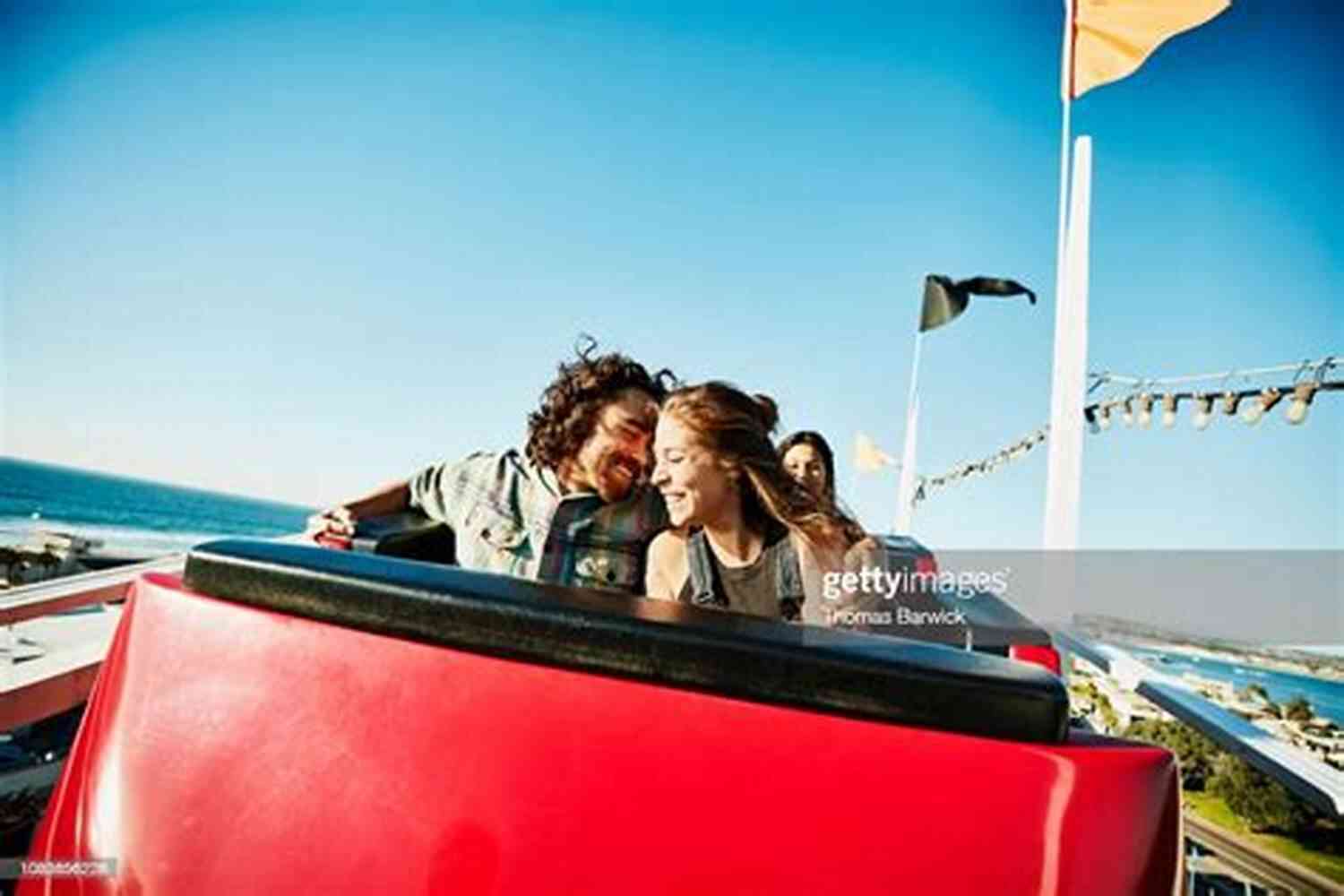 Couple On A Rollercoaster LOVE IS A DANGEROUS GAME