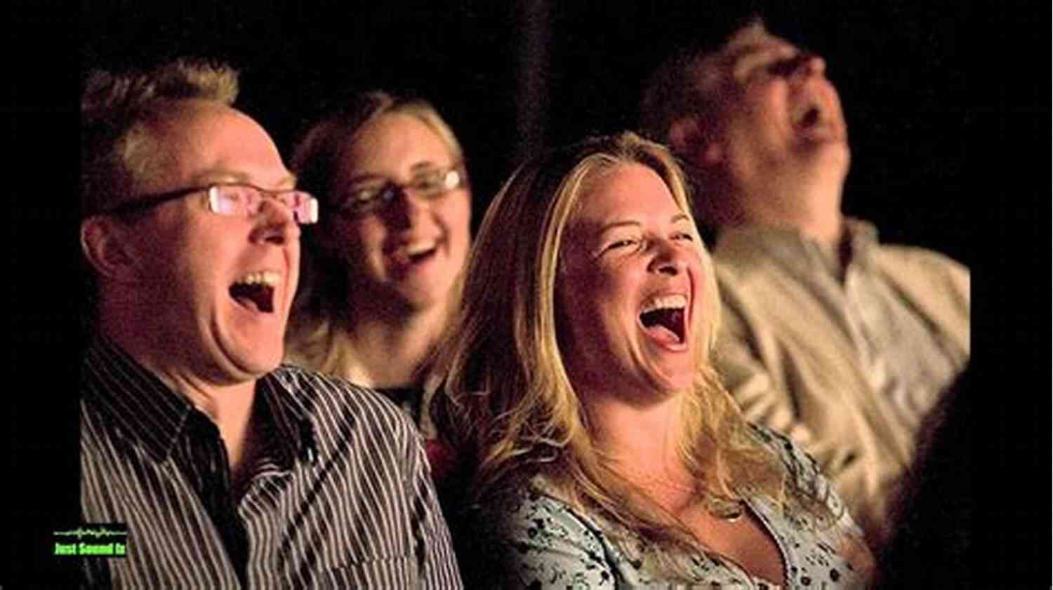 Two Friends Laughing Hysterically During A Comedy Show Timing Is Everything: Two Short Comedies